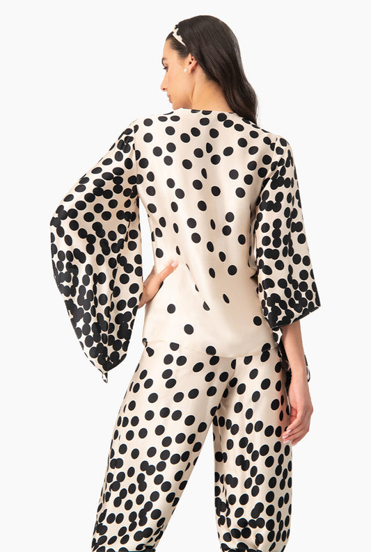 Blusa estampada de lunares con manga amplia y escote en V