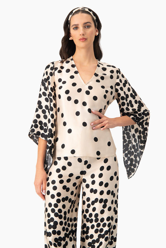 Blusa estampada de lunares con manga amplia y escote en V