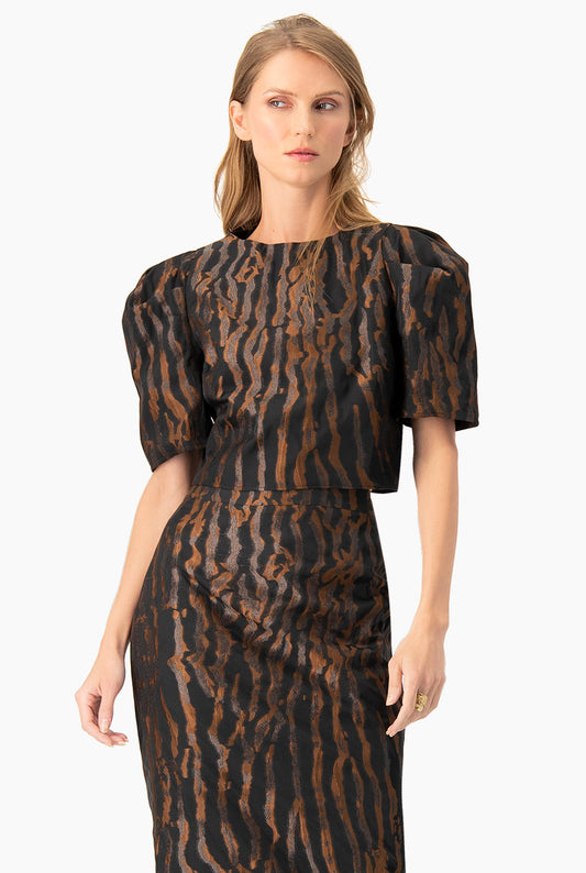 Blusa corta negra de manga globo con estampado animal print y botones traseros