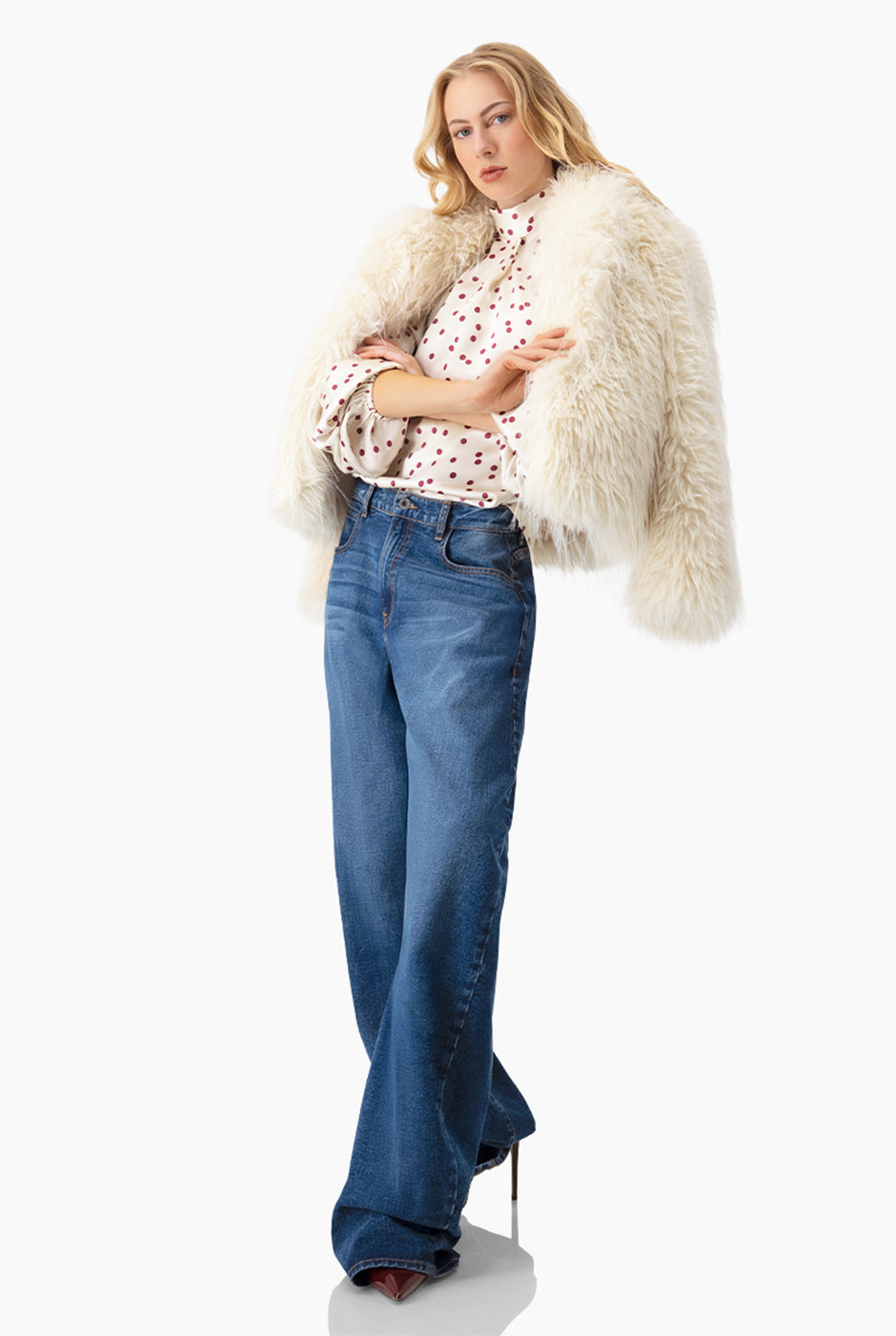 Blusa marfil con lunares y lazo en el cuello