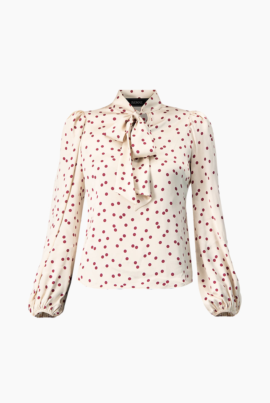 Blusa marfil con lunares y lazo en el cuello