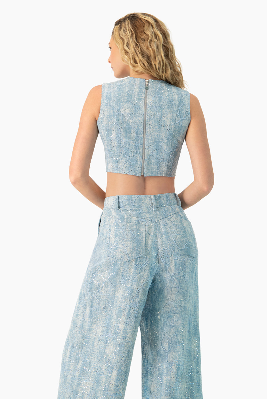 Top denim corto azul sin mangas con cierre trasero