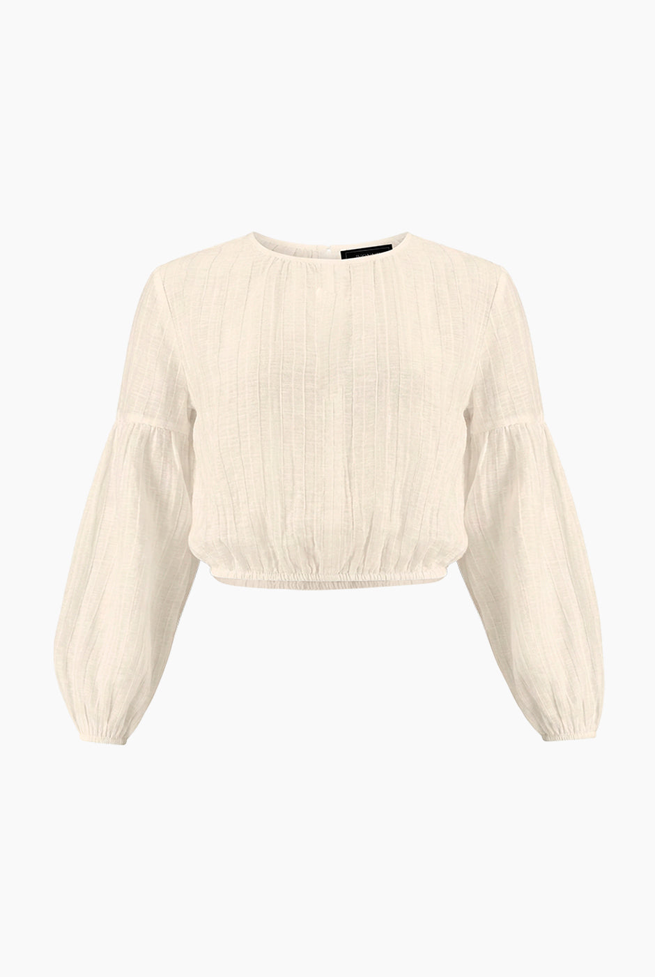 Blusa marfil de manga larga tipo globo, cuello redondo