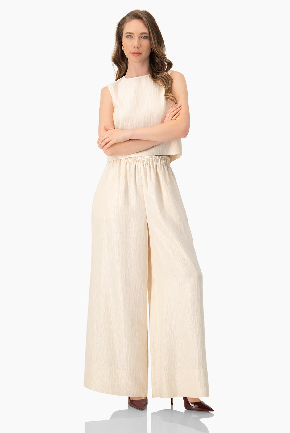 Pantalón amplio natural con cintura elástica y dobladillo suelto